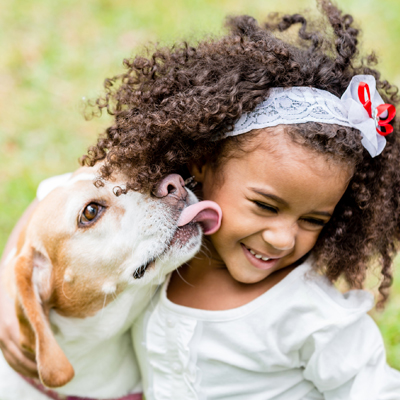 Little girl and puppy